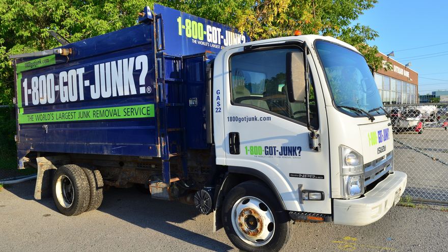 1-800-GOT-JUNK? truck with the phone number across its side
